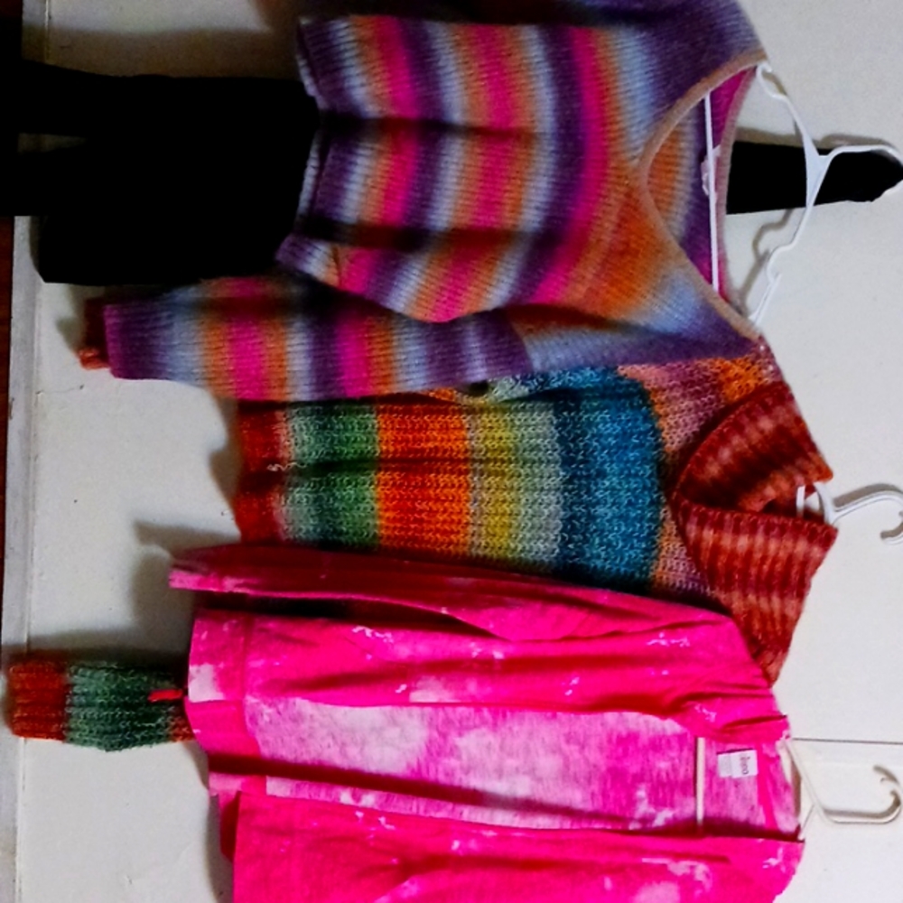 2 sweaters and a zip up hoodie